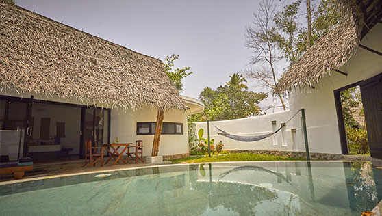 Private pool villa at beach resort Kerala India